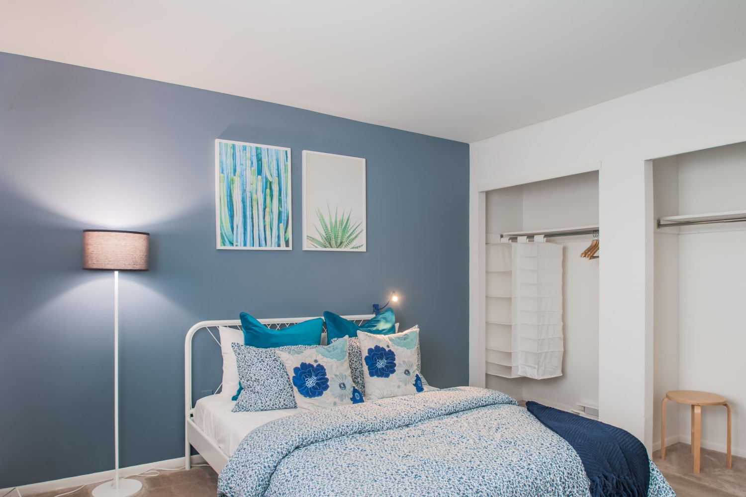Master bedroom with plush carpeting and ample closet space at Kingswood Apartments & Townhomes in King of Prussia, Pennsylvania