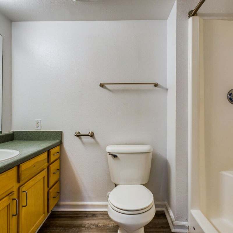 Bathroom with bathtub at Boomer Creek Apartments in Stillwater, Oklahoma