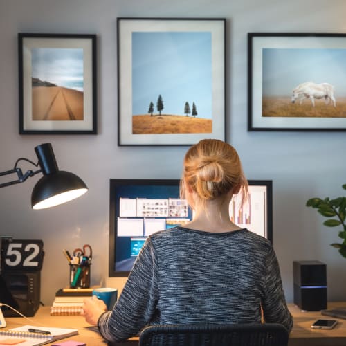 A woman getting work done at M2 Apartments in Denver, Colorado