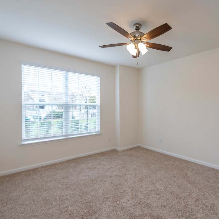 Bedroom with ceiling fan at Magnolia Chase, Virginia Beach, Virginia