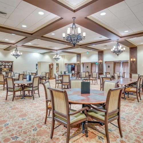 Spacious resident dining hall with plenty of seating at Oxford Vista Wichita in Wichita, Kansas