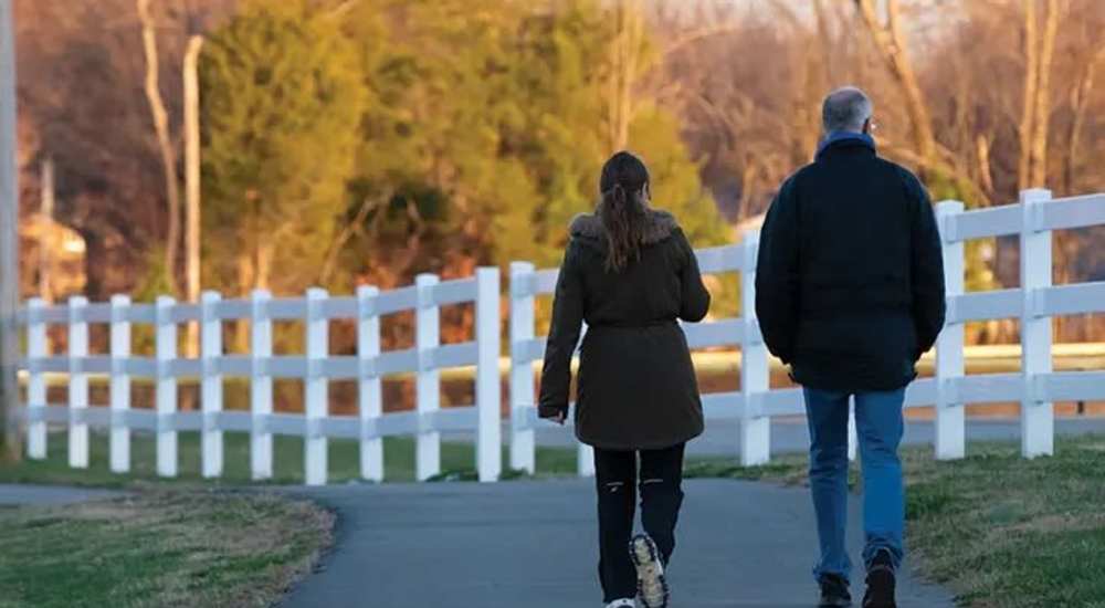 Residents walking near The Flats At Wilkinson in White House, Tennessee