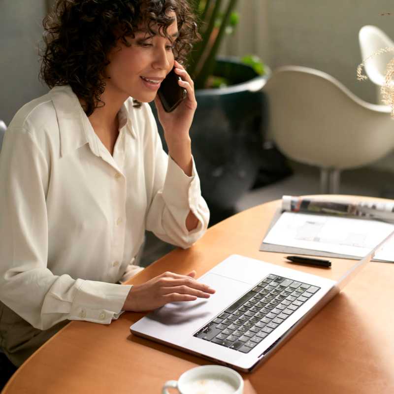 Resident woman managing phone call while working near Altitude on Main in Richmond, Virginia       