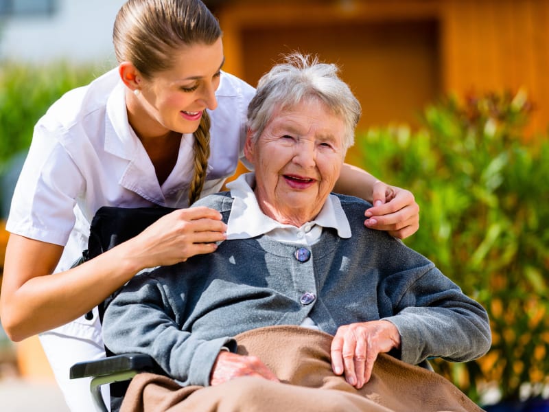 Resident and caregiver at Maple Ridge Care Center in Spooner, Wisconsin