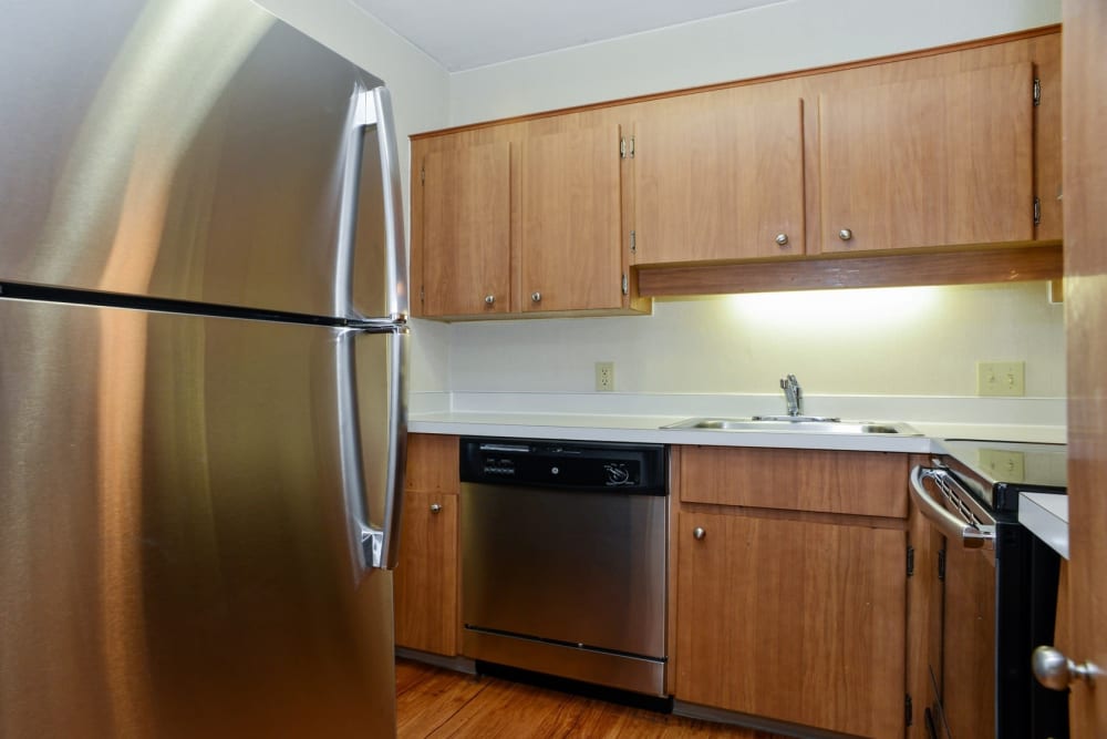 Kitchen with modern appliances at Eagle Rock Apartments at Framingham in Framingham, Massachusetts