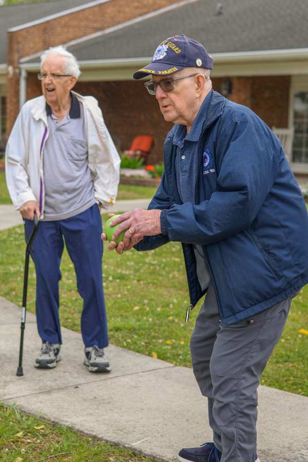 Residents playing putt putt at Truewood by Merrill, Boise in Boise, Idaho