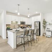 Sit-in kitchen island at Avion Apartments in Jacksonville, Florida