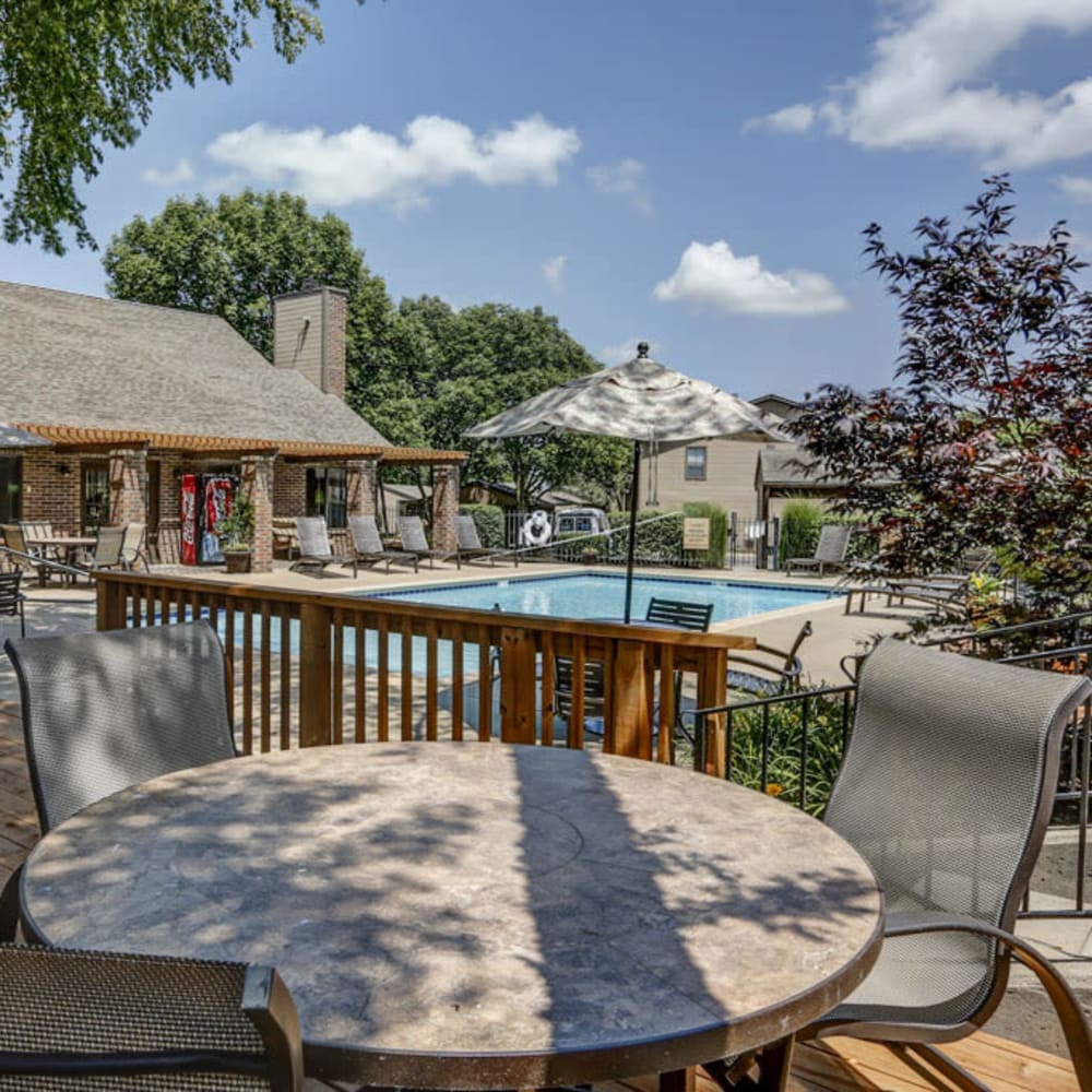 Resident clubhouse at Springhill Apartments features a pool and outdoor recreation area in Overland Park, Kansas