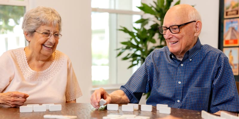 Lovely Couple playing board games at The Blake at Pensacola in Pensacola, Florida