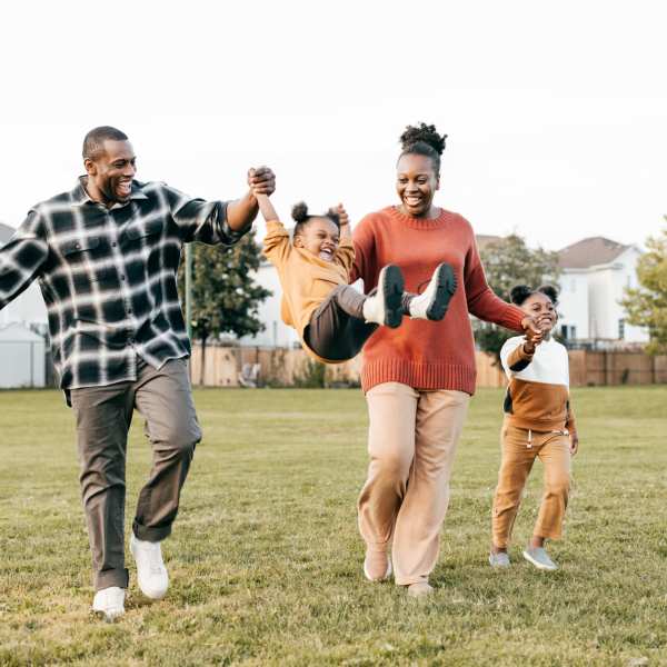 A family plays in a park near The Carlton at Greenbrier, Chesapeake, Virginia