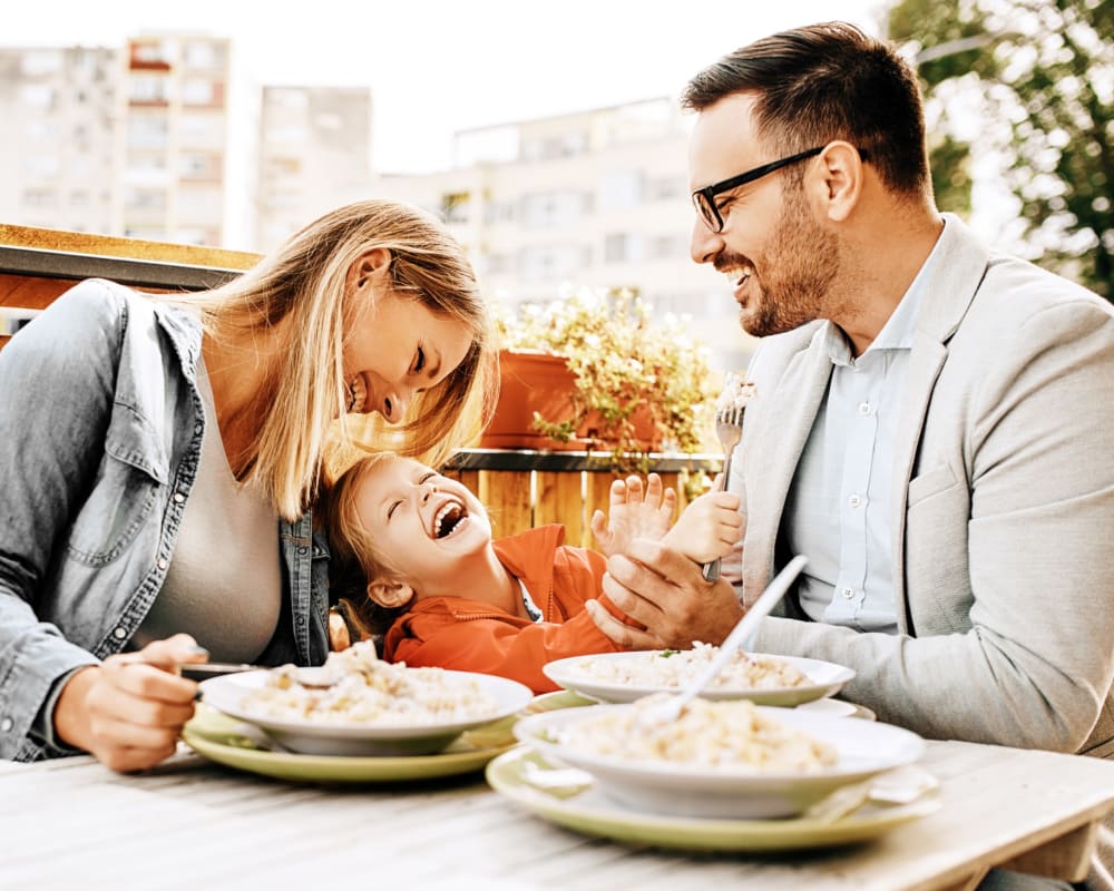 A happy family eating meal near  Ramona Vista in Ramona, California