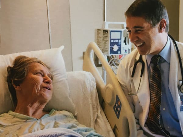 A staff member checking on a patient at Careage Home Health in Bellevue, Washington. 