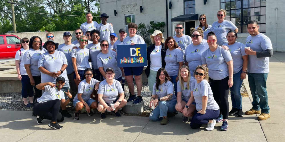 Group of employees at a volunteer event for Drucker + Falk in Newport News, Virginia