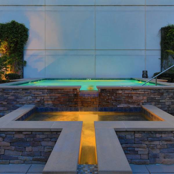 Resort style swimming pool and hot tub at Attain Downtown, Norfolk, Virginia