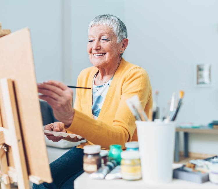 Woman painting at Hampton Woods in Columbus, Ohio