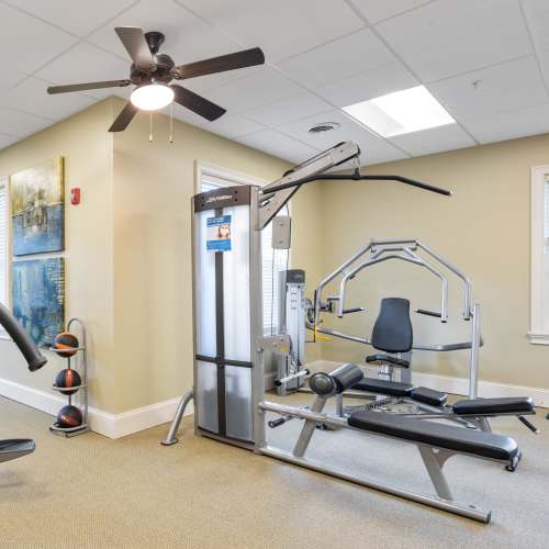 Cardio machines and weights in the high-tech fitness center at Auburn Creek Apartments in Victor, New York