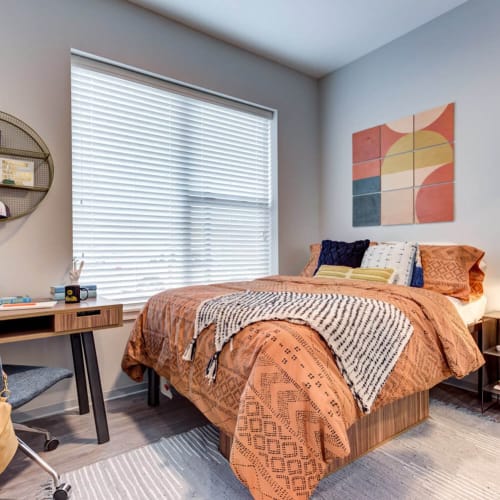 A bright bedroom at The Banks in Coralville, Iowa
