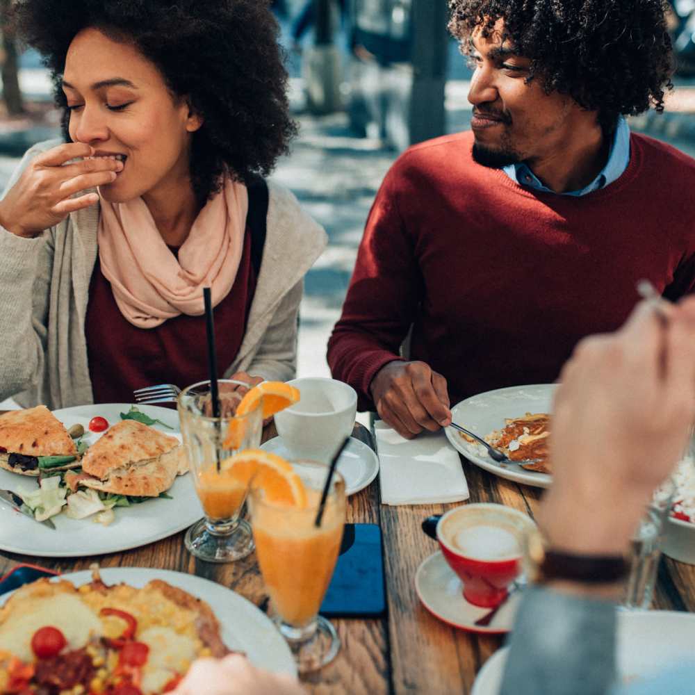 Residents enjoying a meal at restaurant near Willamalane in Milwaukie, Oregon