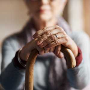 Resident holding a cane at Clearwater at North Tustin in Santa Ana, California