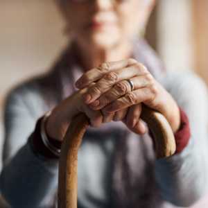 Resident holding a cane at Clearwater at South Bay in Torrance, California