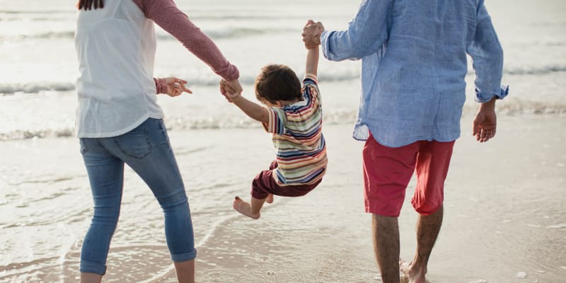 A family having fun at the beach near Castle Acres in Norfolk, Virginia