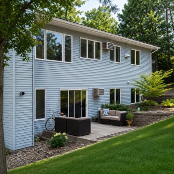Patio with green lawn at Maple Glen in Ames, Iowa