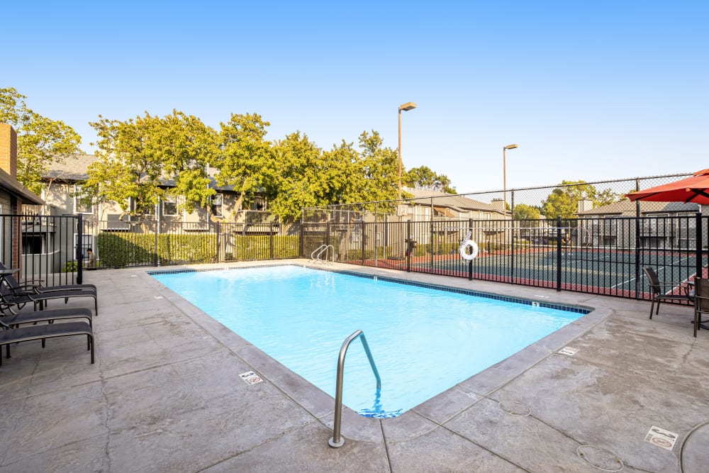 Resort-style spa and swimming pool at Sandpiper Village Apartment Homes in Vacaville, California