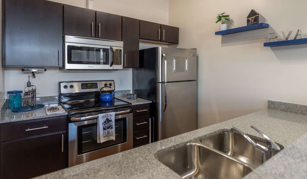 Well-equipped kitchen area at Cedar Broad, Richmond, Virginia