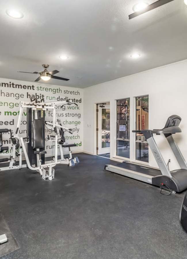 Well-equipped fitness center at Cameron Oaks Apartment Homes in Cameron Park, California
