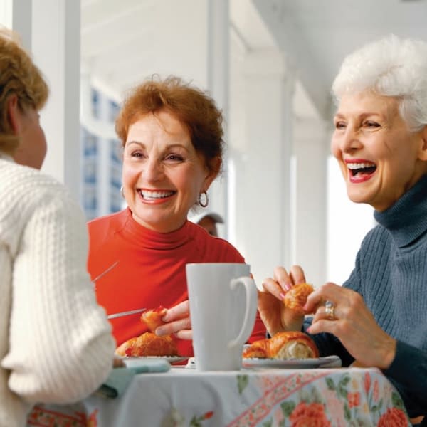 Resident friends eating at Gardens at Escondido in Escondido, California.