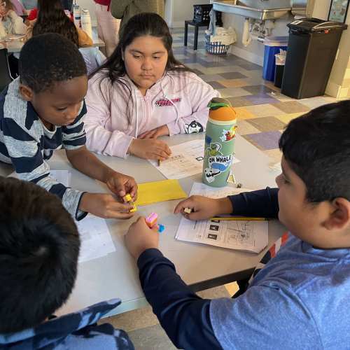 Kids in a classroom at Laurel Creek Apartments in Austin, Texas
