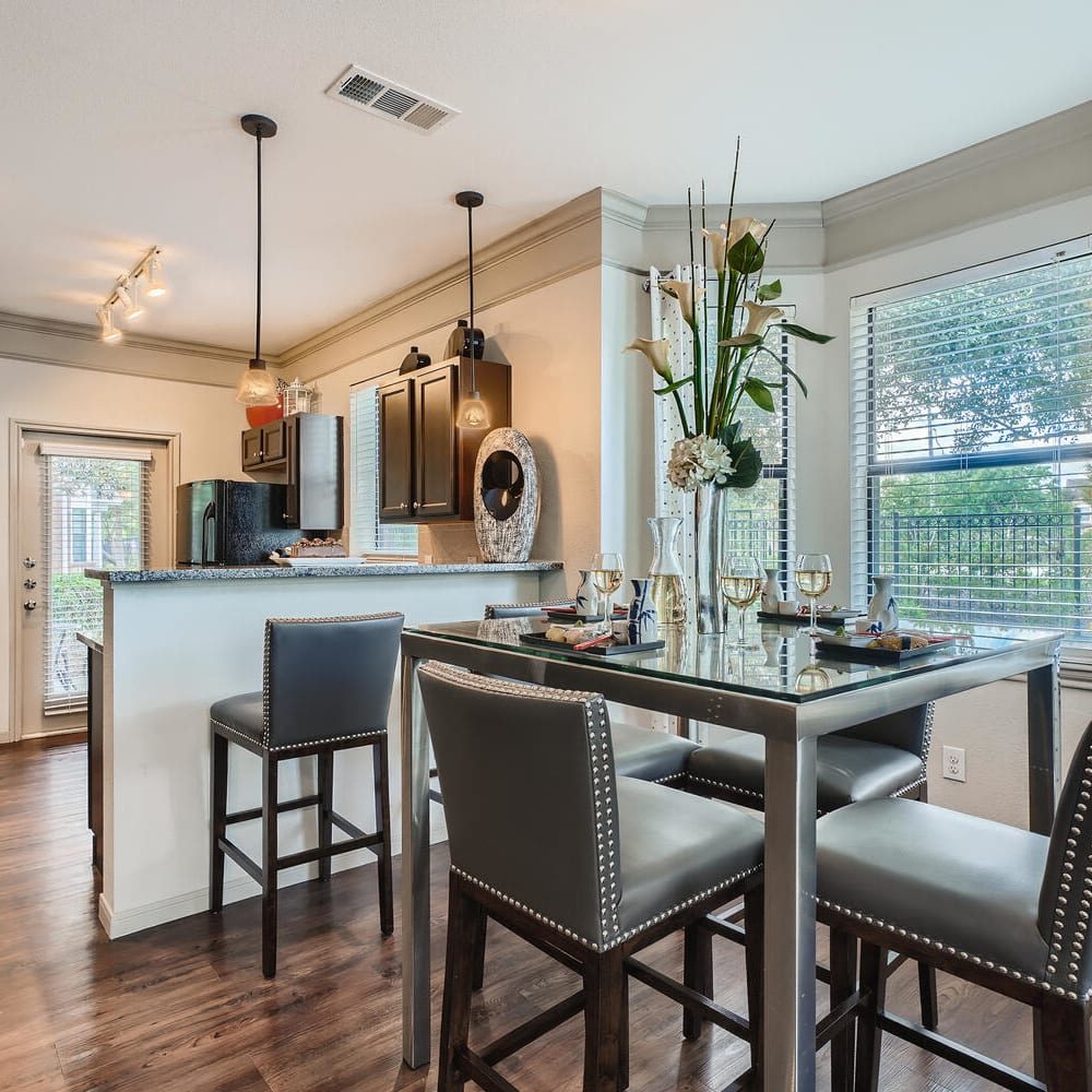 Cozy kitchen and breakfast nook at Grand Villas Apartments in Katy, Texas