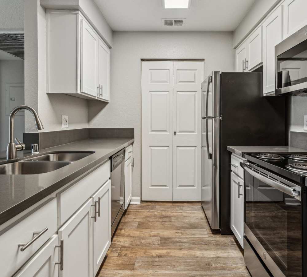 Luxury kitchen with white cabinets and stainless steel