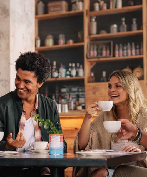 Residents enjoying coffee in a restaurant at The Garden in Pittsburgh, Pennsylvania