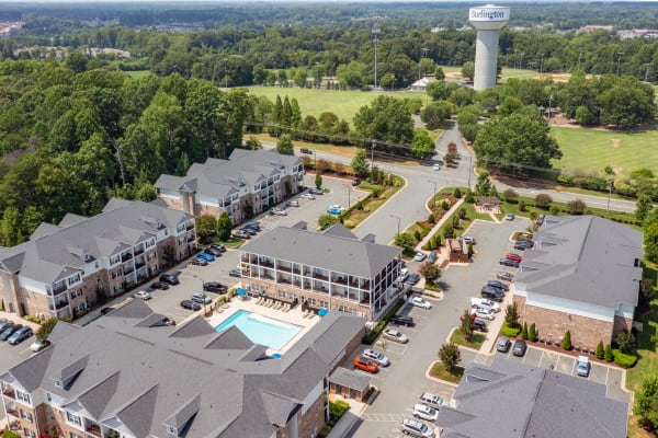 An aerial view of the community next to a park at Retreat at the Park in Burlington, North Carolina