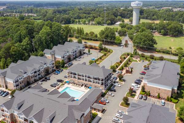 An aerial view of the community next to a park at Retreat at the Park in Burlington, North Carolina