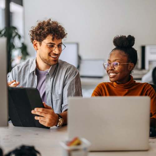 Resident working in business center at Emerald Place in Lancaster, Ohio