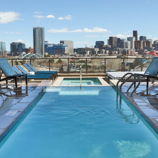 Relaxing pool with a beautiful view of downtown The Alcott in Denver, Colorado