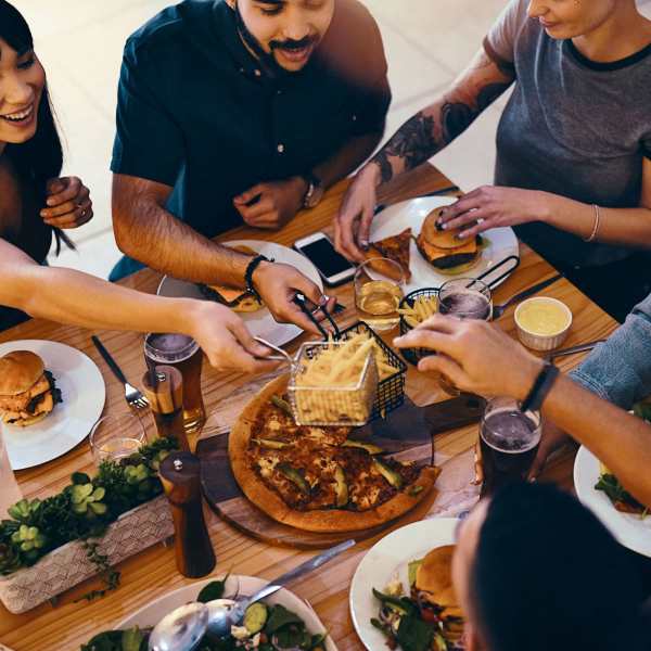 Friends enjoy a meal out near Magnolia Chase, Virginia Beach, Virginia