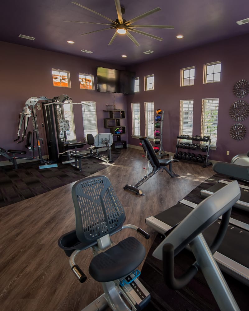 Fully-equipped fitness center at Watercress Apartments in Maize, Kansas