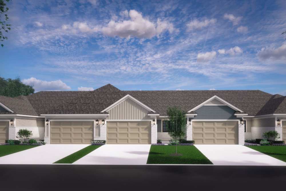 Exterior house in a model home with garage at Encore at West Valley in White Lake, Michigan