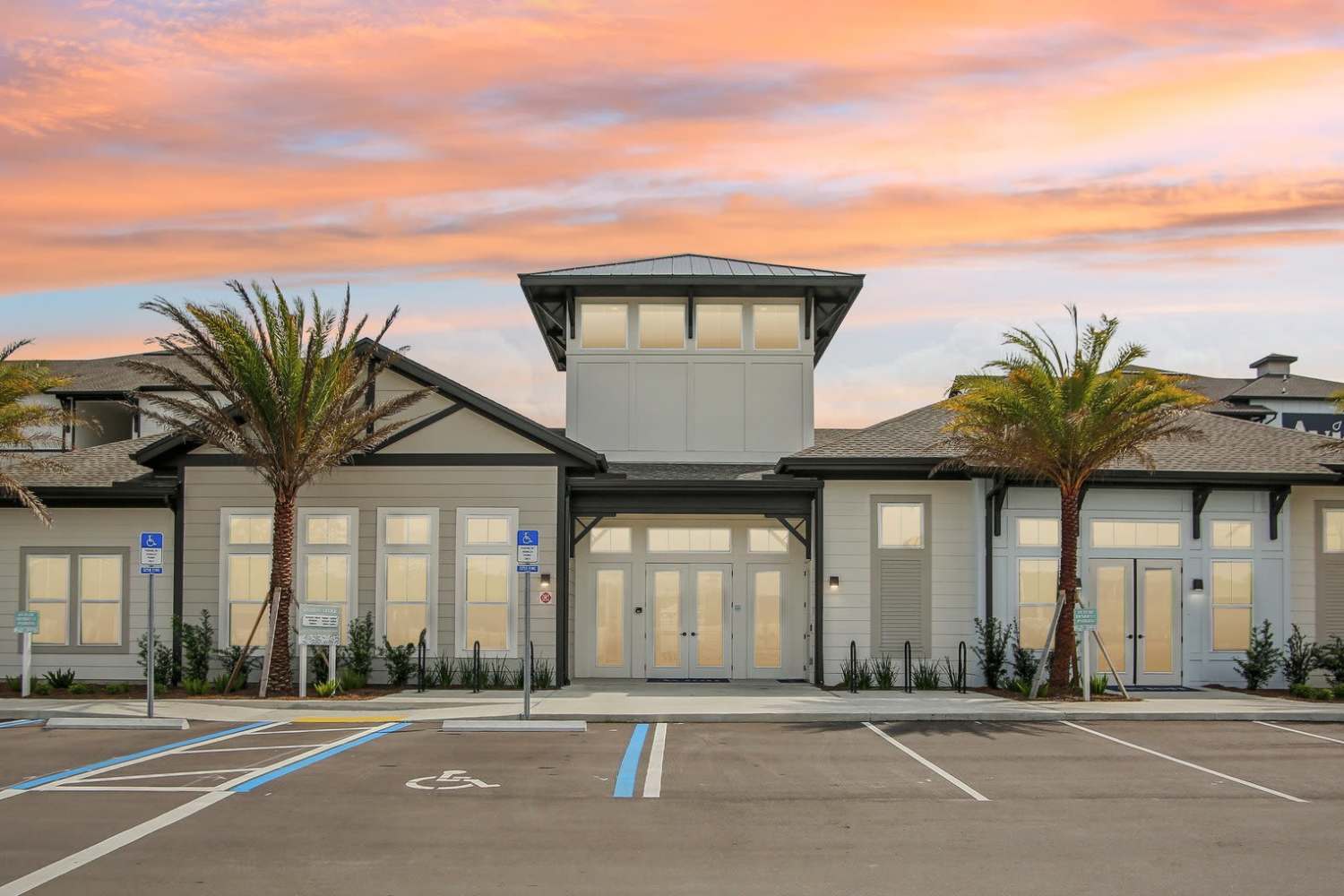Front of leasing office at sunset at Avion Apartments in Jacksonville, Florida