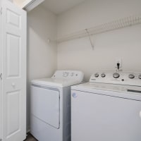 A comfortable full size washer and dryer at Regency Gates in Mobile, Alabama