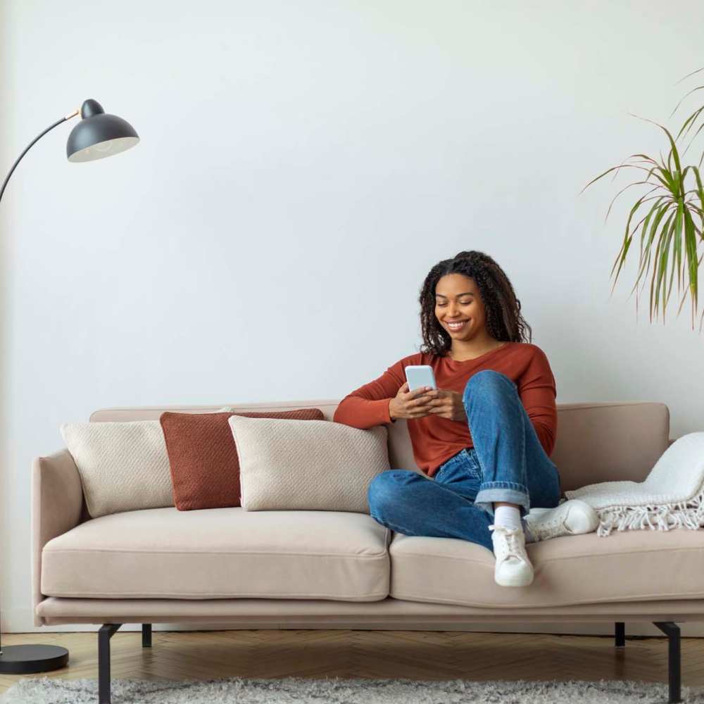 Resident in her spacious living area of an apartment home at Devonwood Apartments in Fayetteville, North Carolina