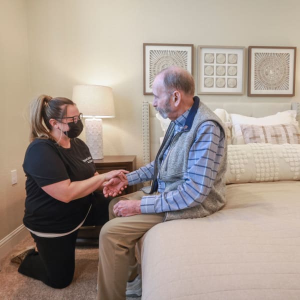 Two residents laughing together at The Princeton Senior Living in Lee's Summit, Missouri