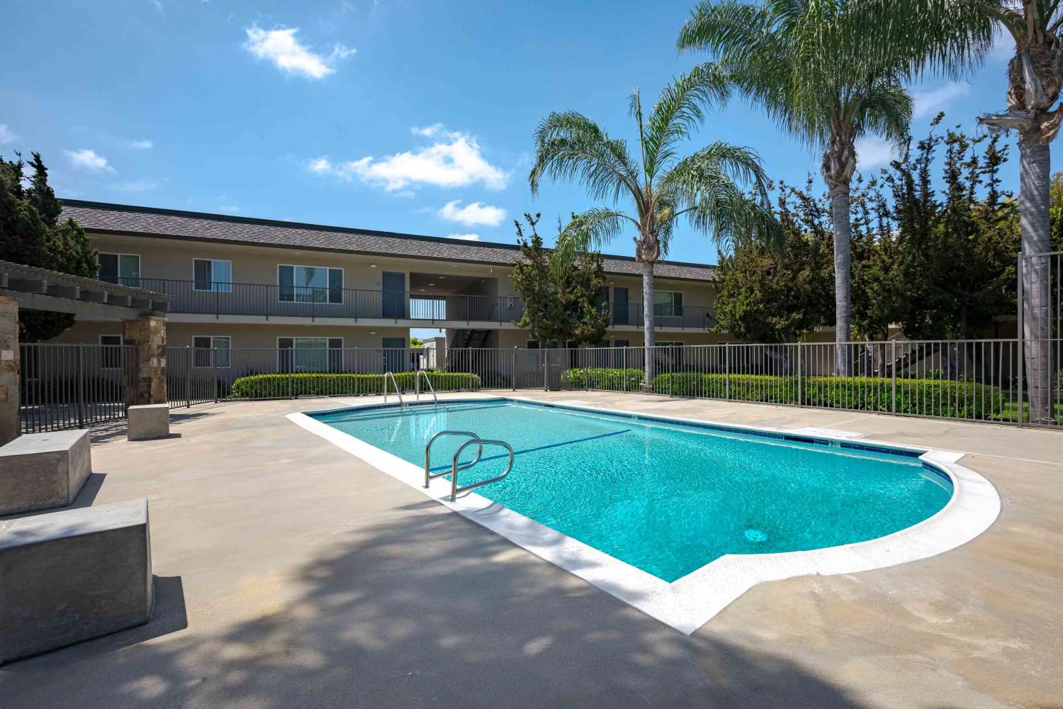 Gated swimming pool at Chatham Village in Tustin, California