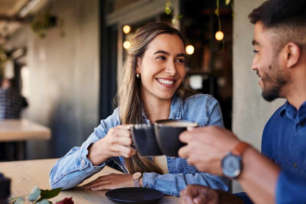 Resident couple having a coffee in a nearby cafe at Walnut Ridge Apartments, Bastrop, Texas