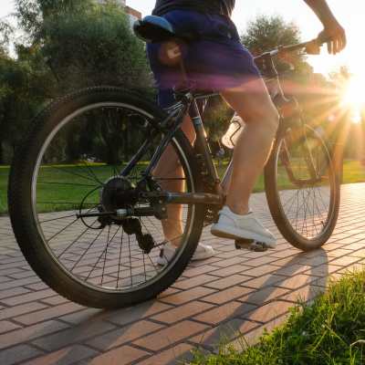 Resident riding a bike in a park near Verde Vue, Savannah, Georgia