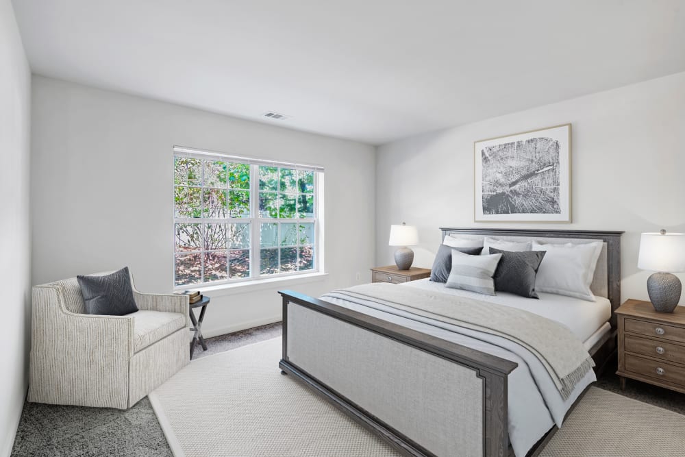 Luxurious and spacious bedroom with access to natural lighting at Horizons at Franklin Lakes Apartment Homes in Franklin Lakes, New Jersey