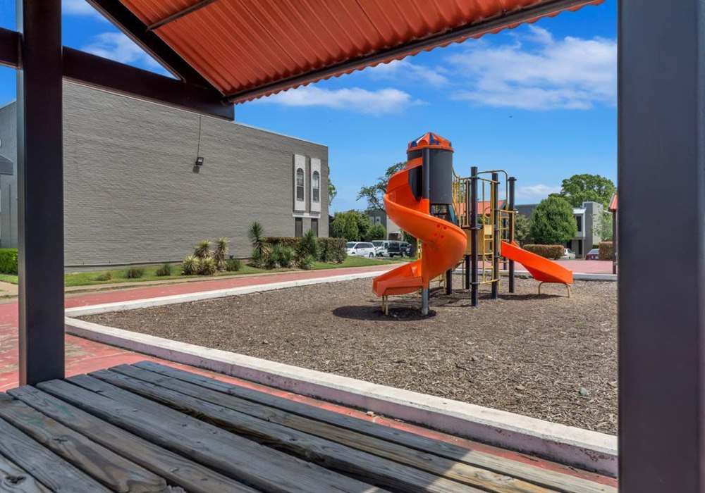 Playground at Mission Pointe Club Apartments in Euless, Texas